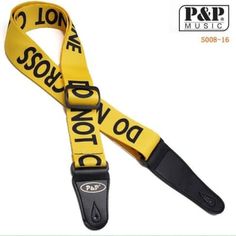 a yellow lanyard strap with black words on the front and bottom, hanging from a white background