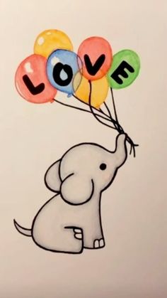 an elephant holding balloons with the word love on it