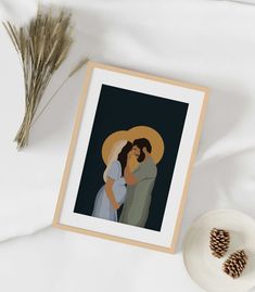 an image of a man and woman in wedding attire with pine cones on the side