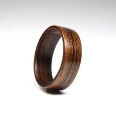 a wooden ring on a white background