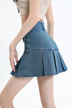 Revisit the cool trends of the late '90s and early '00s with our Y2k Pleated Jean Mini Skort. Combining the best of both worlds, it looks like a skirt but offers the comfort of shorts underneath. Featuring a belt looped waist and twin front pockets, it's a must-have for those nostalgic about Y2K style. Y2k aesthetic Skater skirt Zip & button fastening Dark wash denim material Belt looped waist Cotton, polyester Twin front pockets Skirt with under shorts Blue Mini Length Y2k Skort, Blue Y2k Skort With Pockets, Y2k Denim Blue Mini Skirt With Pockets, Blue Denim Pleated Mini Skirt, Pleated Denim Mini Skirt Y2k, Dark Academia Dresses, Aesthetic Skater, Streetwear Grunge, Jeans Patchwork