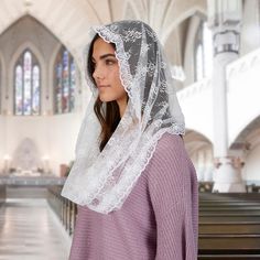 Description: For centuries, women have been wearing veils in church as a symbol of modesty and respect for God. Our beautiful Infinity Chapel Veil is designed to provide coverage and comfort during worship. Featuring a loop design with scalloped lace trim, this veil is a simple yet elegant option for ladies who value modesty. It can be worn around the neck when not in use, making it easy to access during any service. Additionally, it comes with a handy pouch that can be easily tucked into a purs Catholic Veil Aesthetic, Catholic Veils, Lace Trim Veil, Catholic Head Covering, Religious Veils, Catholic Veil, Design Loop, Church Furniture, Church Candles