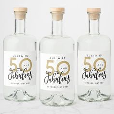 three bottles of personalized 50th birthday gin