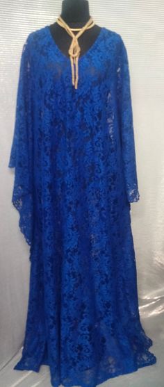 Floor length lace kaftan Comes with a matching scarf and camisole One size fits all( fits up to size 26) Electric blue color Blue Lace Maxi Dress With Lace Trim, Elegant Lace Maxi Kaftan, Lace Dress With Lace Work For Eid, Floor-length Lace Dresses For Eid, Elegant Lace Dress For Eid, Eid Lace Dress With Lace Work, Elegant Long Lace Kaftan, Blue Lace Long Sleeve Maxi Dress, Blue Lace Maxi Dress With Long Sleeves