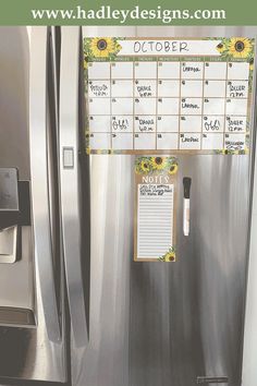 a stainless steel refrigerator with magnets on the door and calendar pinned to it's side