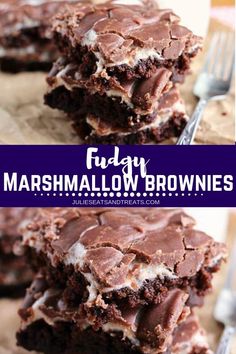 chocolate marshmallow brownies stacked on top of each other with a bite taken out