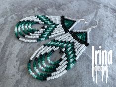 White and emerald Native american style beaded earring Seed bead earrings Emerald earring Fringe earring Native earrings Dangle earring Boho Bohemian Teardrop Beaded Earrings With Spacer Beads, Bohemian Teardrop Earrings With Spacer Beads, Traditional Dangle Beaded Earrings With Spacer Beads, White Southwestern Beaded Earrings For Festivals, Traditional Green Beaded Earrings With Large Beads, Traditional Green Teardrop Beaded Earrings, White Beaded Southwestern Earrings, Green Large Beaded Earrings For Festival, Bohemian Green Beaded Fringe Earrings