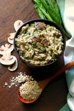 a bowl filled with mushroom and spinach oats