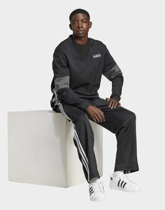 There they are, the icons of an era, reimagined for today in a fresh wash of colour. These adidas Adicolor Firebird track pants give a nod to the archives while keeping their style rooted in the now. The regular fit, drawstring elastic waist and soft piqué fabric ensure all-day comfort.• This model is 185 cm and wears a size M. Their chest measures 93 cm and the waist 73 cm.• Regular fit• Drawcord on elastic waist• 52% cotton, 48% polyester (recycled)• Side pockets Adidas Adicolor, In The Now, Jd Sports, Firebird, Baggy Fits, For Today, Black Adidas, Track Pants, Adidas Originals