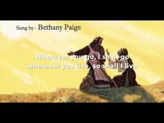 an image of two people sitting on top of a hill with the words, song by beth