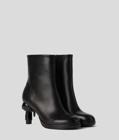 Featuring a playful, 3D Ikonik Karl-molded heel, these mid-length boots epitomize KARL LAGERFELD statement style. Heel Boots For Women, Heel Accessories, Timeless Dress, Rock Chic, Blouse Jeans, Beach Wear Dresses, Boot Accessories, Backpack Travel Bag, Shopper Tote