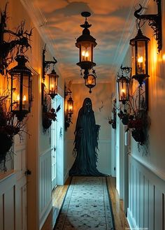 a hallway decorated for halloween with lights and decorations on the walls, ghost figure in doorway