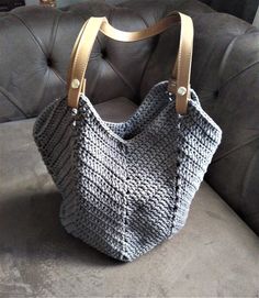 If you want to see my other handmade knit bags; https://www.etsy.com/shop/yarnisland?ref=seller-platform-mcnav&section_id=27294020 This bag is crochet with %100 cotton macrame yarn. It has leather handle. There are removable leather handles with snaps. Boho style is quite fashionable shoulder bag. This round bag would be unique gift to give someone or to buy yourself. Measurement Height : 38 cm, 15 inches Width : 39 cm, 15,4 inches Handles: 78 cm, 31 inches *Ready to ship *3-5 working days a Bohemian Crochet Bucket Bag With Leather Handles, Bohemian Crochet Tote Bucket Bag, Everyday Hand Knitted Tote Shoulder Bag, Everyday Hand-knitted Tote Shoulder Bag, Bohemian Handmade Hobo Bag For Everyday, Handmade Everyday Tote Beach Bag, Everyday Bohemian Crochet Bag With Braided Handles, Everyday Crochet Beach Shoulder Bag, Everyday Crochet Shoulder Beach Bag