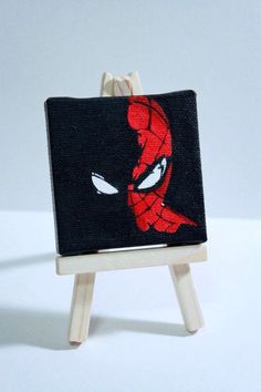 a small canvas with spiderman on it