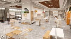 the interior of a retail store with tables and chairs