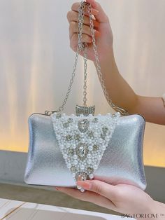 BagForLove - Chic Wedding & Party Clutch: Elegant Faux Pearl & Rhinestone Embellished Accessory Product Description Color Silver Bag Size Mini Pattern Type Plain Type Box Bag Material Iron Size Chart INCH CM Bag Height Bag Length Bag Width 5.5 inch 7.9 inch 2.6 inch Bag Height Bag Length Bag Width 14 cm 20 cm 6.5 cm Details Pictures Similar Products h2 { text-align: center; } /* æ¢è¡ */ li{ white-space: normal; word-break: break-all; word-wrap: break-word; } .red-box { width: 100%; display: fl Rhinestone Bags For Banquet, Rhinestone Embellished Bags For Banquet, White Party Bag With Rhinestones, Silver Bags For Wedding And Party Season, Chic Wedding Party, Silver Bag, Silver Bags, Party Clutch, Gold Bag