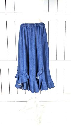 "Vintage blue ruffle flowy long denim jean skirt Measurements...taken flat -marked size: no label -across waist: 15\"-20\" -length: 33\" Features... -medium weight cotton denim -cool ruffle tiered detail -stretch waist -lovely drape and flow -unlined Condition: -excellent vintage condition -gently worn" Spring Denim Blue Flare Skirt, Denim Blue Flare Skirt For Spring, Spring Flare Denim Blue Skirt, Spring Denim Skirt In Dark Wash With Unfinished Hem, Flared Denim Skirt In Medium Wash For Summer, Summer Flare Denim Skirt In Medium Wash, Spring Dark Wash Denim Skirt With Unfinished Hem, Spring Long Skirt With Ruffle Hem, Spring Flare Skirt With Stretch