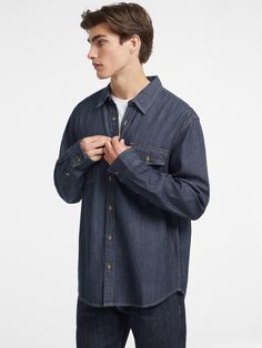 Our denim long sleeve shirt. Keep it casual or make a statement. Made with our signature GUESS JEANS denim featuring GUESS AIRWASH™. Chambray Long Sleeve Shirt, Relaxed Fit, Chambray Long Sleeve Shirt With Relaxed Fit, Chambray Long Sleeve Relaxed Fit Shirt, Dark Wash Chambray Denim Jacket For Fall, Dark Wash Chambray Denim Top For Fall, Fall Dark Wash Chambray Denim Top, Long Sleeve Washed Blue Denim Top, Washed Blue Long Sleeve Denim Top, Denim Blue Shirt With Snap Buttons