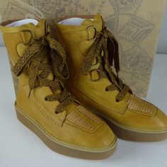 Free People Boots ”Bristen” Mountain Bootie Leather Upper & Lining Synthetic Sole Wide Lace Style Roughly 1.5” Platform Moc Stitched Seams Brand New In Box Pricing Is Fair And Quite Firm . Please Let Us Know If You Have Any Questions. Yellow Leather Boots With Lug Sole, Casual Yellow Boots With Vibram Sole, Yellow Leather Boots With Leather Sole, Yellow Leather Boots For Fall, Yellow Leather Boots With Round Toe, Yellow Leather High-top Boots, Yellow High-top Leather Boots, Casual Yellow Closed Toe Boots, Yellow Boots With Rubber Sole For Fall