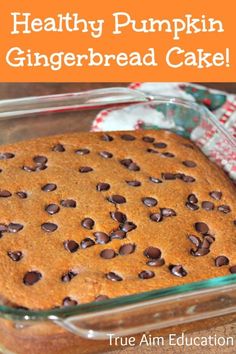 healthy pumpkin gingerbread cake in a glass baking dish with text overlay that reads, healthy pumpkin gingerbread cake