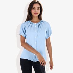 The Anna-Kaci Women's Short Sleeve Button Down Blouse with Gathered Neckline is a perfect addition to your everyday wardrobe. Crafted from soft, breathable fabric, this blouse features a gathered neckline and a button-down front that combine comfort with a touch of elegance. The short sleeves ensure a relaxed fit, making it ideal for warm weather or layering under a jacket. Whether you're running errands, enjoying a casual day out, or heading to a lunch date, this versatile blouse pairs effortle Blue Blouse With Button Closure For Day Out, Light Blue Buttoned Shirt For Day Out, Light Blue Tops With Buttons For Day Out, Light Blue Buttoned Tops For Day Out, Light Blue Short Sleeve Blouse With Buttons, Light Blue Short Sleeve Button Blouse, Light Blue Button-up Blouse For Day Out, Light Blue Buttoned Tops For Work, Spring Blue Blouse With Back Button Closure