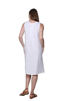 This sleeveless dress has beautiful handmade embroidery and it's a want for every women's wardrobe. It is crafted in 100% linen with a scoop neckline and side pockets Style: DressMaterial: 100% LinenNeck Style: ScoopSleeve Length: Sleeveless Care Instruction: Machine WashColors: WhiteModel Number: 2401 Casual Embroidered Linen Dress, Unlined Knee-length Linen Dress, Embroidered Sleeveless Linen Dress, Sleeveless Linen Dress With Floral Embroidery, Sleeveless Embroidered Linen Dress, Sleeveless Unlined Linen Day Dress, Sleeveless Unlined Linen Dress For Daywear, Unlined Sleeveless Linen Daywear Dress, Unlined Sleeveless Linen Dress