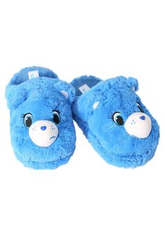 a pair of blue slippers with a bear face on them