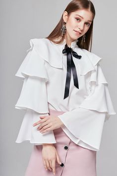 White Ruffled Blouse For Office, White Tie Sleeves Blouse For Fall, White Blouse With Tie Sleeves For Fall, White Tie Sleeve Blouse For Fall, Fall White Blouse With Tie Sleeves, Elegant White Top With Ribbon, Elegant White Tops With Ribbon, White Fall Blouse With Bow, Office Blouse With Ruffled Collar And Ruffles