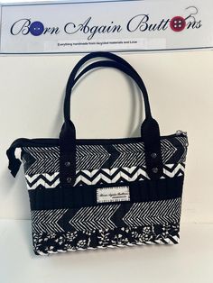 Scraps of black & white cotton fabrics were sewn together and then quilted to make this one of a kind, small handbag. Approx. 12" X 8" x 2" it's a perfect size: not too big, not too small. Top zipper allows wide opening for full access and the sturdy, riveted, nylon handles make it easy to grab 'n go! Two inside, slip pockets for your phone &/or keys. D-rings are sewn into both side seams if you care to add a shoulder or crossbody strap (sold separately).  Sooo cute! Quilted Handbag, Quilted Handbags, Small Handbag, D Rings, Handbag Black, Cotton Fabrics, Small Handbags, Quilt Making, Black Handbags