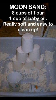 a pile of toilet paper sitting on top of a sink