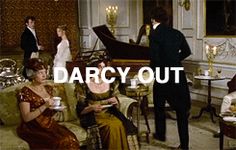 a group of people standing and sitting around a living room with the words darcy out in front of them