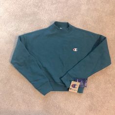 Urban Outfitters Xs Cropped Champion Sweatshirt Nwt Never Worn. Teal. Urban Outfitters Sporty Long Sleeve Sweatshirt, Sporty Long Sleeve Sweatshirt By Urban Outfitters, Urban Outfitters Crew Neck Sweater, Urban Outfitters Blue Tops For Streetwear, Urban Outfitters Winter Streetwear Tops, Green Crew Neck Top From Urban Outfitters, Urban Outfitters Green Crew Neck Top, Urban Outfitters Blue Winter Tops, Blue Urban Outfitters Top For Fall