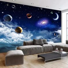 this is an image of a living room with planets and stars in the sky wallpaper