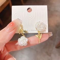 Description:Chic Resin White Flower Earrings Specifications: Material: Alloy Metal, Resin, 18k GoldColors: goldSize: 3.2 cm * 1.6 cmWeight: 7.2 g/pcs Add a touch of whimsy with these Chic Resin White Flower Earrings. These earrings are not your average pair - they feature delicate white resin flowers that will make you bloom with confidence. Perfect for adding a playful touch to any outfit! 🌸 White Flower Earring, Flower Dangle Earrings, Chic Flowers, Wedding Banquet, Resin Flowers, Lovely Earrings, Different Outfits, Social Events, White Flower