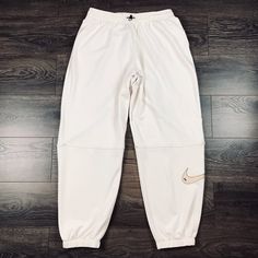 Nike Sportswear Swoosh Women’s Oversized Fit High Rise Joggers Sz Xl Dm6205-030 2.23 Item #: 19 Size: Xl Color: Beige Flat Measurements: Waist: 16.5” In Inseam: 30.5” In New With Tags Please Review All Photos And We Encourage To Ask Questions Before Purchasing. Thank You, Oversized Sporty Sweatpants For Sports, Nike Oversized Sporty Activewear, Sporty White Pants For Sports Season, Sporty Oversized Sweatpants, Oversized Cotton Sweatpants For Sports, Oversized Sporty Pants, Nike Oversized Activewear For Streetwear, Oversized Nike Athleisure Activewear, White Sweatpants For Sports Season