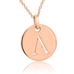 "Introducing our elegant 14K gold disc pendant, a versatile accessory that adds a touch of sophistication to your style. This pendant features a high-polished disc with a beautifully cutout block letter A, and the best part is that we offer all letters of the alphabet, allowing you to personalize your pendant to perfection. Choose from yellow, white, or pink/rose gold to match your unique style and preference. Handcrafted with pride in the vibrant city of New York, this pendant showcases excepti Elegant Round Initial Necklace, Elegant Sterling Silver Round Disc Coin Necklace, Classic Rose Gold Medallion Necklace, Rose Gold Initial Necklace With Round Pendant, Elegant Hallmarked Coin Necklace With Round Pendant, Elegant Hallmarked Round Pendant Coin Necklace, Classic Round Rose Gold Initial Necklace, Classic Rose Gold Round Initial Necklace, Rose Gold Round Initial Necklaces