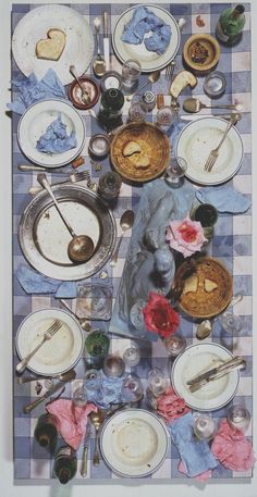 an overhead view of a table with plates and silverware