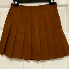 New Without Tags, Never Worn! Cute Skirt, Just Too Small For Me. Should Fit Someone Who’s A Size 4 For Reference My Measurements: Height - 5’3 Chest - 39 In Waist - 28 In Hips - 40 In. I Usually Wear A Size 6 Or M I’d Be Happy To Answer Any Questions :) Brown Lined Tennis Skirt For Spring, Short Length Skort For School, Short Skort For School In Fall, Brown Pleated Mini Skirt For Spring, Trendy Short Skort For School, School Skort For Fall, Short Length, Fall School Skort In Short Length, Short Length Fall Skort For School, Casual Mini Length Shorts For School