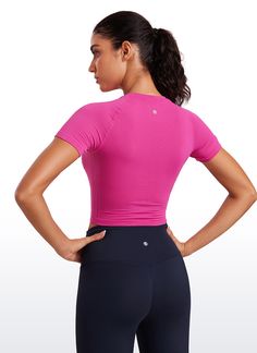 Seamless collection of smooth, soft knit fabric is designed to help reduce chafing and quick drying. Cropped tee with slim-fit design flatters your figure. Raglan sleeves for maximum comfort. Perfect for workout, training and sports. Feature & Fitting: 
 Designed for running and training 
 Slim fit, crop length 
 Raglan sleeve, crew neck 
 Fabric: 
 Fast sweat-wicking keep you dry 
 Minimal seams to reduce chafe 
 Four-way stretch, good elasticity, no sense of restraint 
 96% Polyamide, 4% E Breathable Fitted T-shirt For Workout, Fitted Breathable T-shirt For Athleisure, Fitted Athleisure T-shirt For Training, Seamless Short Sleeve T-shirt For Gym, Fitted T-shirt For Workout, Fitted Seamless Crew Neck Top, Supportive Stretch Yoga Tops, Pink Athleisure T-shirt For Yoga, Snug Fit Elastane Activewear For Training