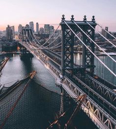 an aerial view of the brooklyn bridge in new york city