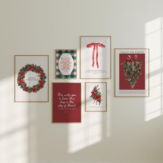 there are many christmas cards on the wall