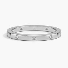 a diamond set wedding ring in white gold