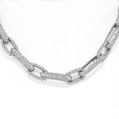 Imagine stepping into a world of enchantment and elegance, where every sparkle tells a story of love and beauty. Feast your eyes on our mesmerizing 18K White Gold 41 Carat Pave Diamond Link Chain Necklace, a true masterpiece crafted for those who appreciate the finer things in life.Prepare to be captivated by the sheer brilliance of this necklace, adorned with a breathtaking 41.37 carats of pave set round cut diamonds. Each diamond glimmers and dances with every movement, creating an ethereal au Diamond Birthstone, Link Chain Necklace, Tennis Necklace, Diamond Design, Metal Necklaces, Chain Link Necklace, Round Cut Diamond, Estate Jewelry, Pave Diamonds