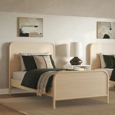 a bed room with two beds next to each other