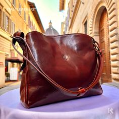 This bag has been made of the best genuine leather by local master crafters of Florence in Italy, designed for women who only accept premium Italian quality and luxury leather bags and modern Italian fashion. . Size: Width:30cm/11.811inch Height:24cm/9.4inch Depth: 10cm/3.9inch Color: Dark Brown . The Story Of this Bag: Once upon a time, there was a woman named Sarah who had recently lost her mother. The loss had left her feeling empty and she was struggling to cope with the pain. She missed her Italian Leather Bag As Gift, Italian Leather Bag As A Gift, Luxury Smooth Grain Shoulder Bag As Gift, Classic Bags In Vegetable Tanned Leather As Gift, Classic Smooth Grain Shoulder Bag As Gift, New Mom Gift Basket, Italian Leather Purse, Italian Chic, Handmade Leather Bags