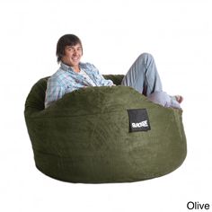 a man sitting in a bean bag chair