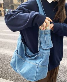 Trendy Blue Canvas Bag With Pockets, Blue Denim Canvas Bag With Pockets, Trendy Denim Shoulder Bag With Pockets, Casual Denim Satchel Shoulder Bag, Blue Denim Shoulder Bag With Pockets, Denim Blue Crossbody Shoulder Bag With Pockets, Casual Denim Shoulder Bag For Daily Use, Large Capacity Denim Hobo Shoulder Bag, Denim Hobo Shoulder Bag With Large Capacity