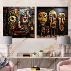 three paintings on the wall in a living room