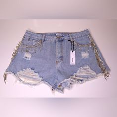 New, Never Worn. Diamond Fringe Side Details. No Stretch. Party Cutoff Denim Shorts, Summer Party Cutoff Bottoms, Trendy Denim Blue Party Bottoms, Trendy Cutoff Bottoms For Party, Denim Party Shorts, Short Denim Jeans For Party, Spring Party Denim Jean Shorts, Short Denim Party Jeans, Glamorous Denim Bottoms For Night Out