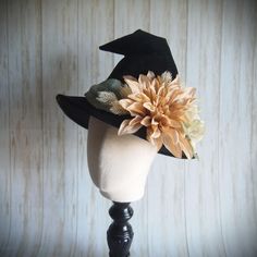 SIZE: 21.5" *For more styles, sizes, and designs, please visit our Website at:        www.EvercrumblyandWitch.com Black velveteen Witch Hat with an orange faux silk band and a cluster of fall foliage!     Brim is approx. 3" (What we call our "Demi" brim!)  This hat is ready to ship! Every hat we make is made by us in our studio! They are sized for correct comfort and fit! Please let us know if you are unsure how to measure your head.   Carefully packed and shipped to you to ensure it arrives safely!      Makes a great gift! Witch Hats, Hat Ideas, Costume Hats, Witch Hat, Fall Foliage, Costume Accessories, Headpiece, Witch, Great Gifts